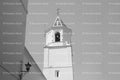 Minimalist View of a White Church Tower Against the Sky (Monochrome)
