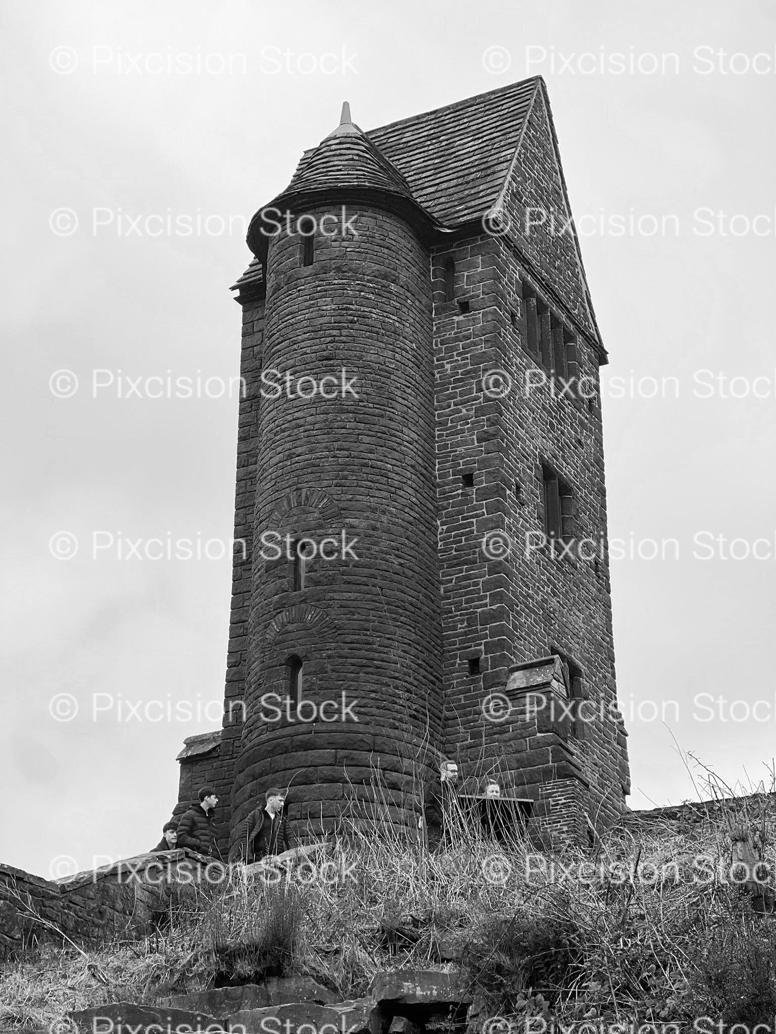 Historic Stone Watchtower or Monument on a Hillside (Monochrome)