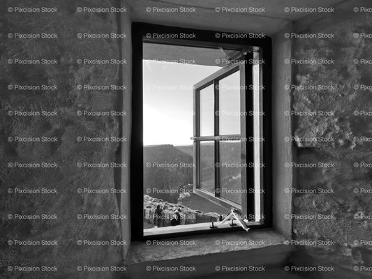 Open Window on a Textured Stone Wall looking out at a Landscape (Monochrome) - Stock Video