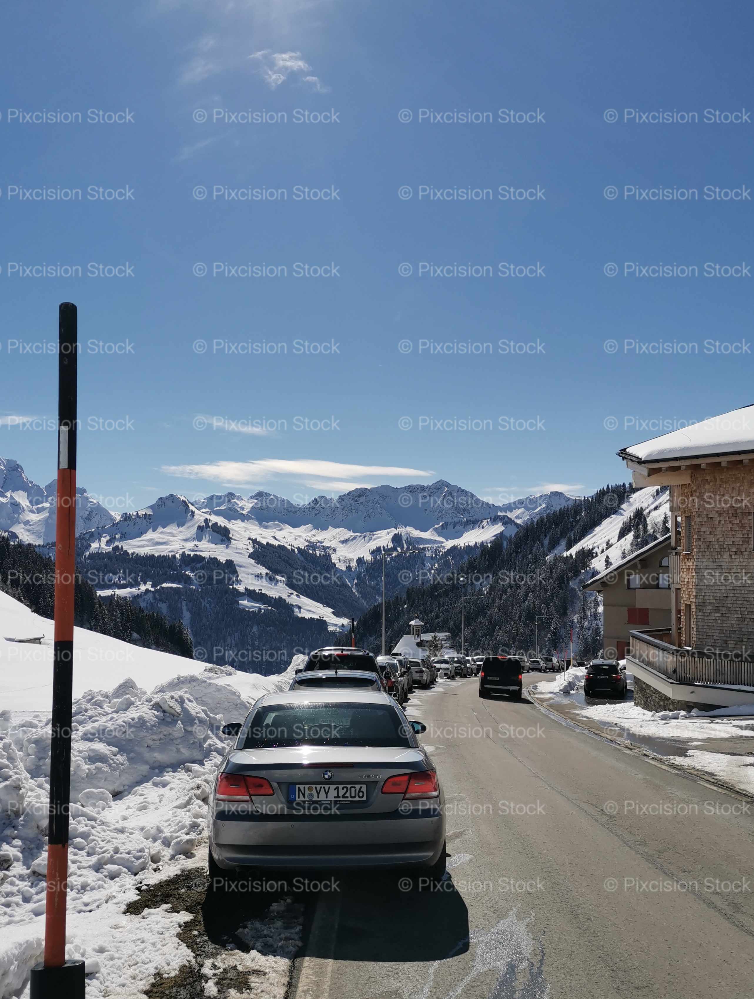 Winter Alpine Road Snow Mountains BMW Car Tyrol Austria Mobile Stock Photo