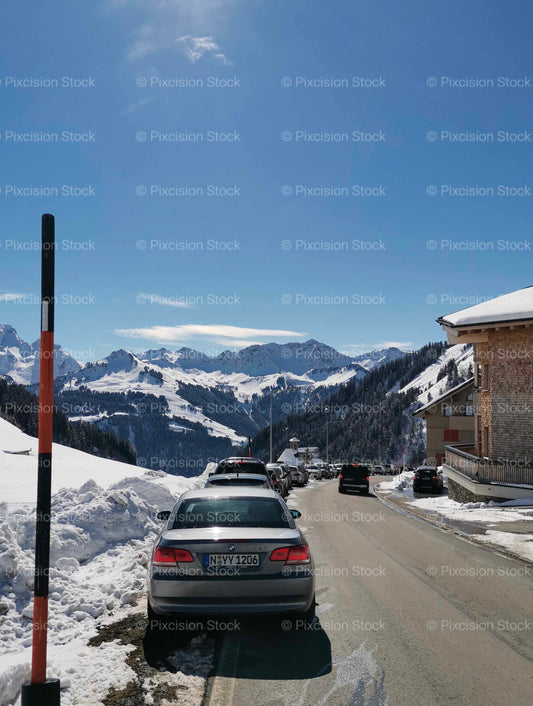 Winter Alpine Road Snow Mountains BMW Car Tyrol Austria Mobile Stock Photo