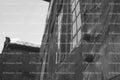 Low-Angle Shot of a Old Wooden Building Corner Against the Sky (Monochrome)