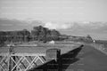 Stone Wall Runway Overlooking a Scenic Landscape (Monochrome)