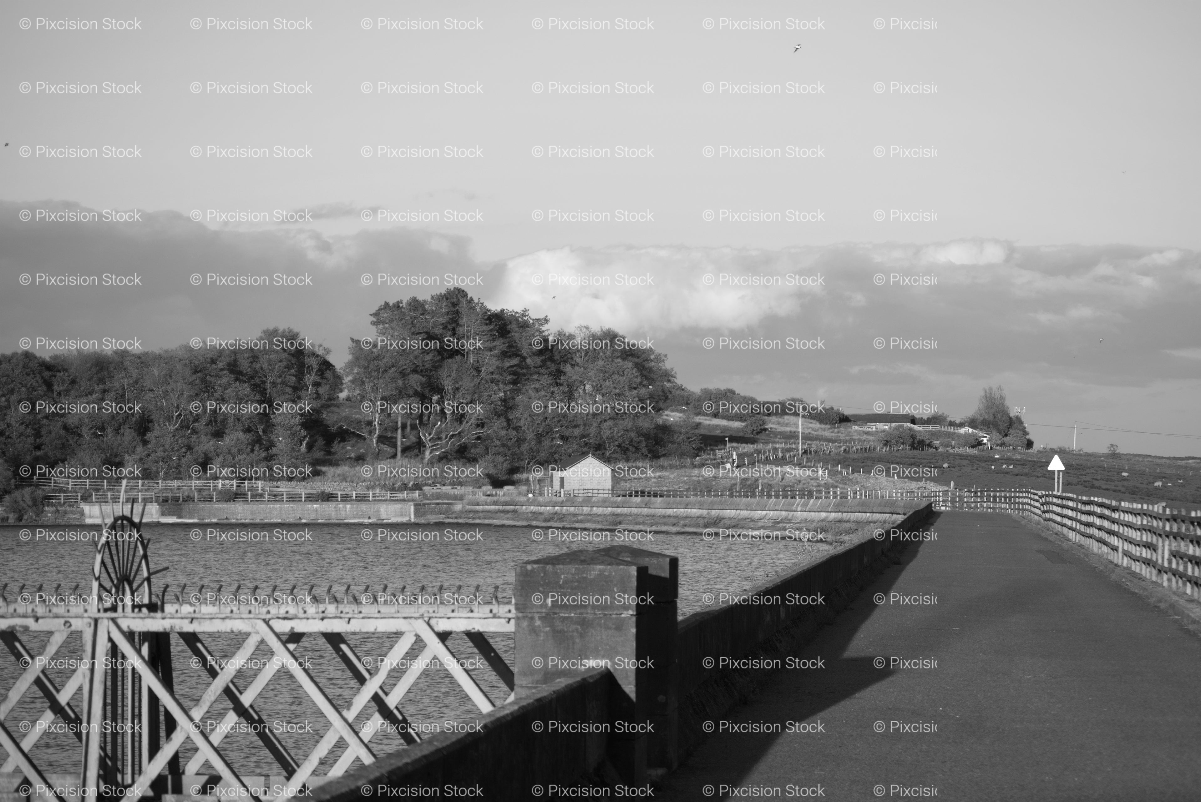 Stone Wall Runway Overlooking a Scenic Landscape (Monochrome)