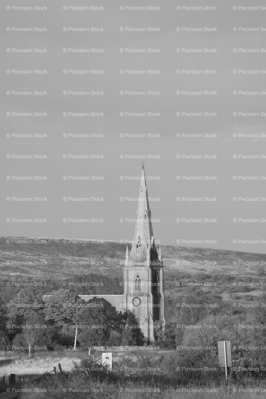 Tall Church Spire Rising Above a Mountainous Valley (Monochrome) - Stock Video