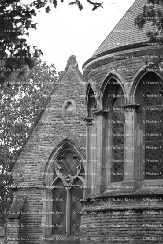 Side Elevation of a Stone Gothic Church with High Arched Windows (Monochrome) - Stock Video