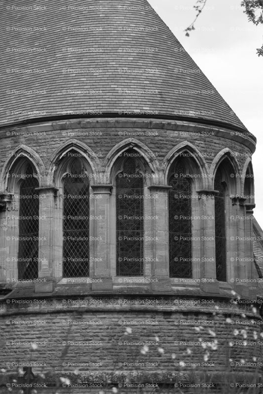 Multi-Windowed Semi-Circular Stone Wall of a Historic Building (Monochrome)