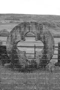 Large, Circular Stone Monument or Millstone on a Farmstead (Monochrome)