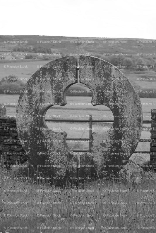 Large, Circular Stone Monument or Millstone on a Farmstead (Monochrome) - Stock Video