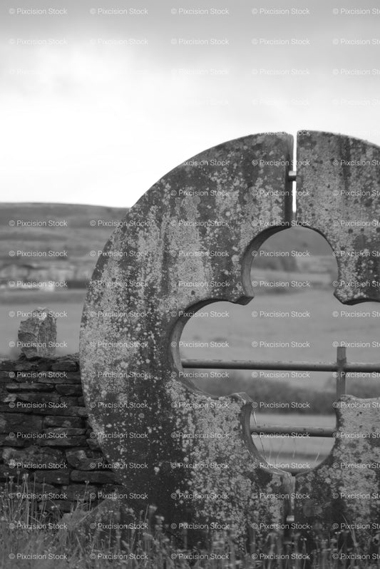 Close-Up Profile of a Unique Circular Stone Gate Entrance (Monochrome)