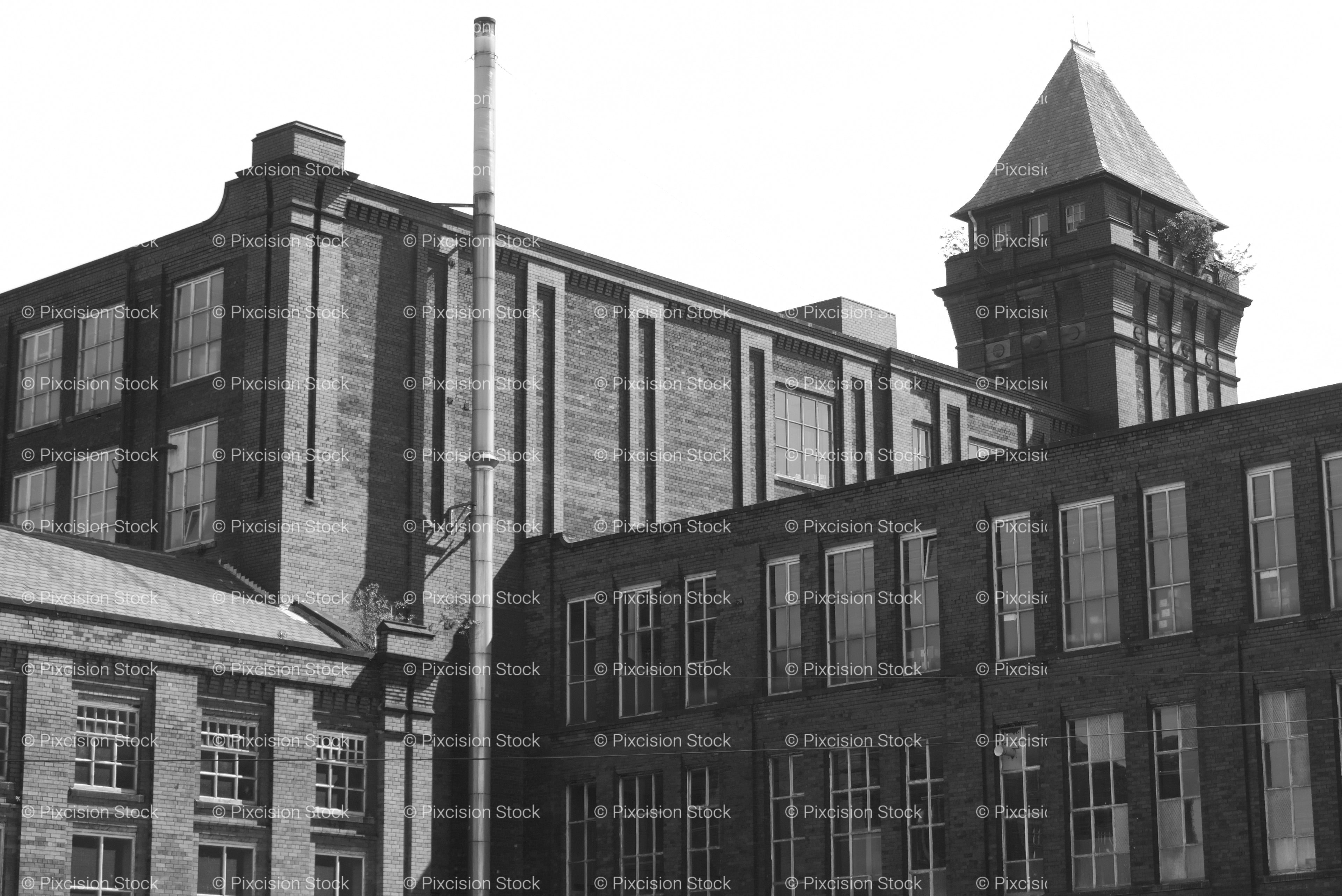 Exterior Architecture of an Old Multi-Story Factory or Mill Building