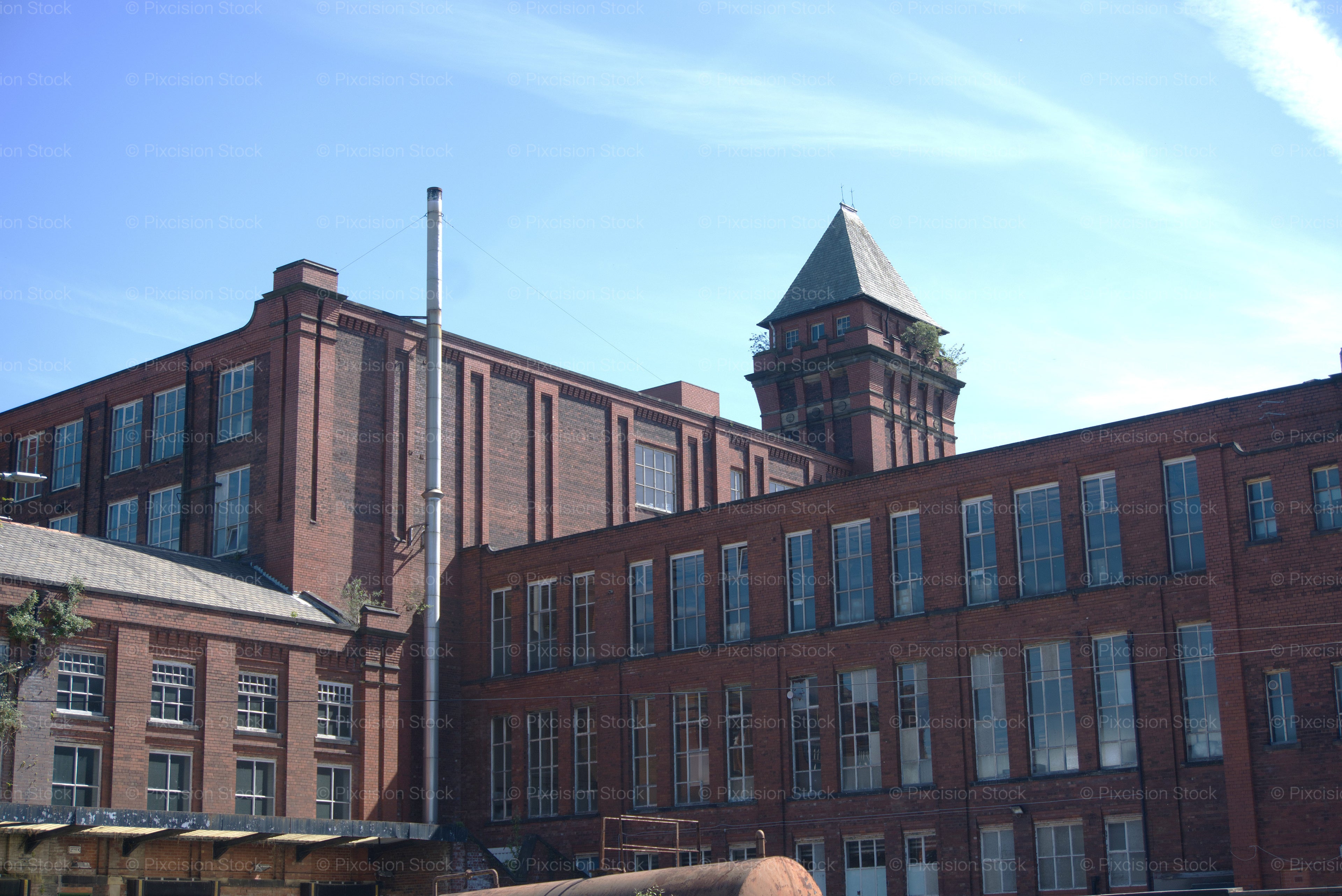 Exterior Architecture of an Old Multi-Story Factory or Mill Building