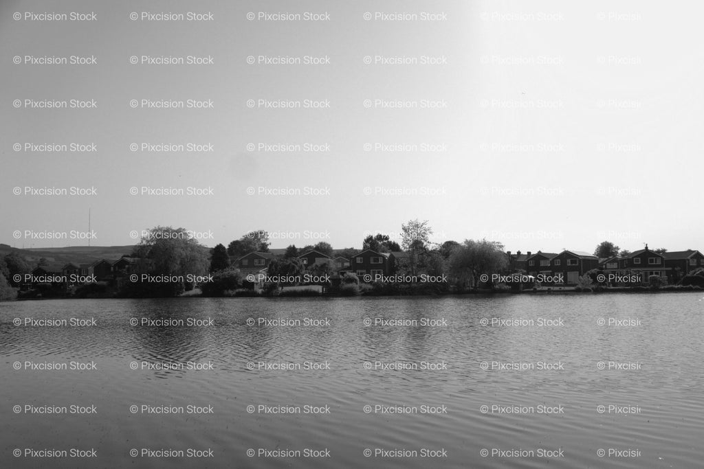 Panoramic View of a Wide River Under a Clear Sky (Monochrome) - Stock Video