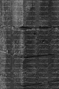 Vertical Abstract Shot of a Weathered Stone Pillar (Monochrome)