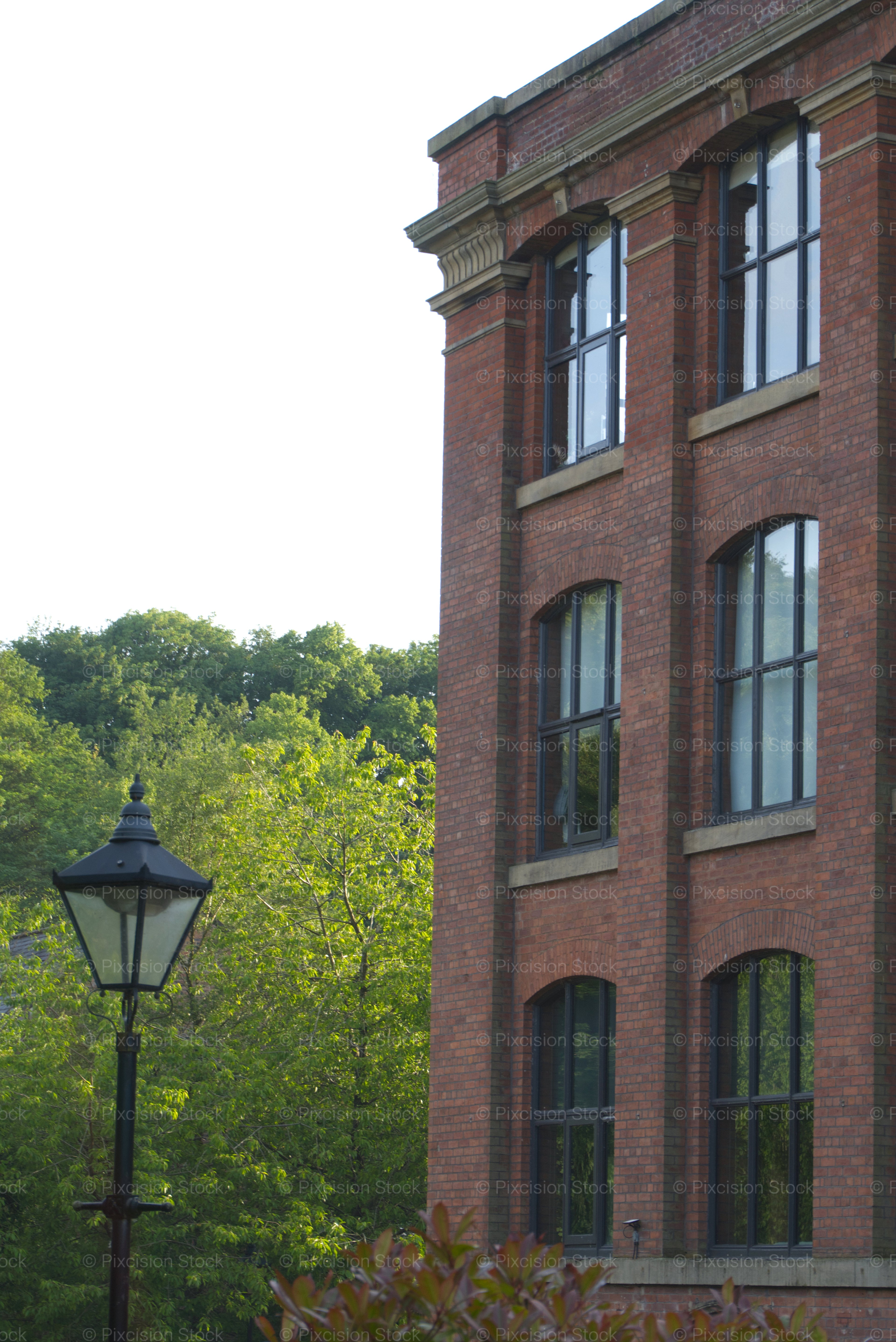 Exterior View of a Multi-Story Brick Industrial Mill Building