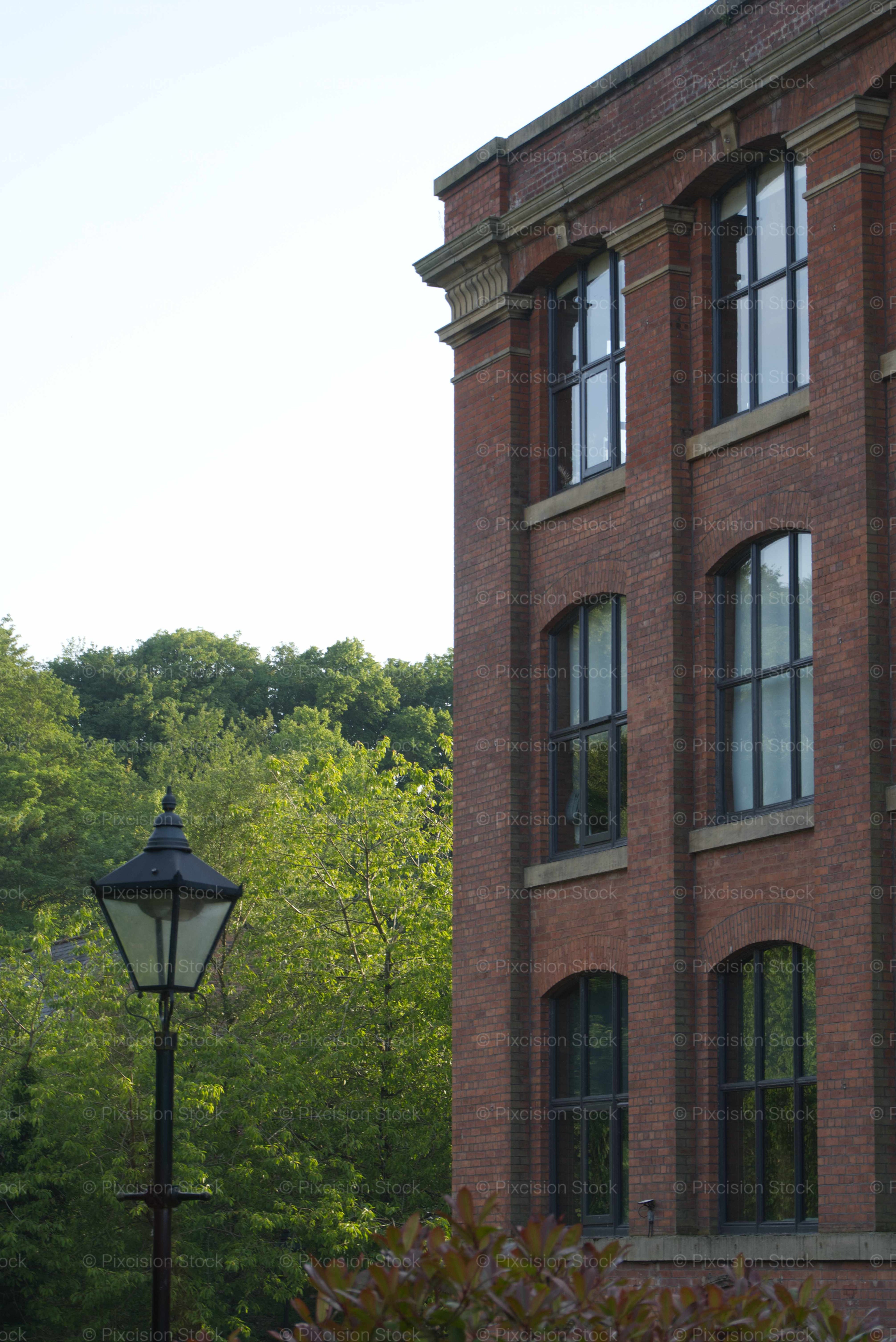 Exterior View of a Multi-Story Brick Industrial Mill Building