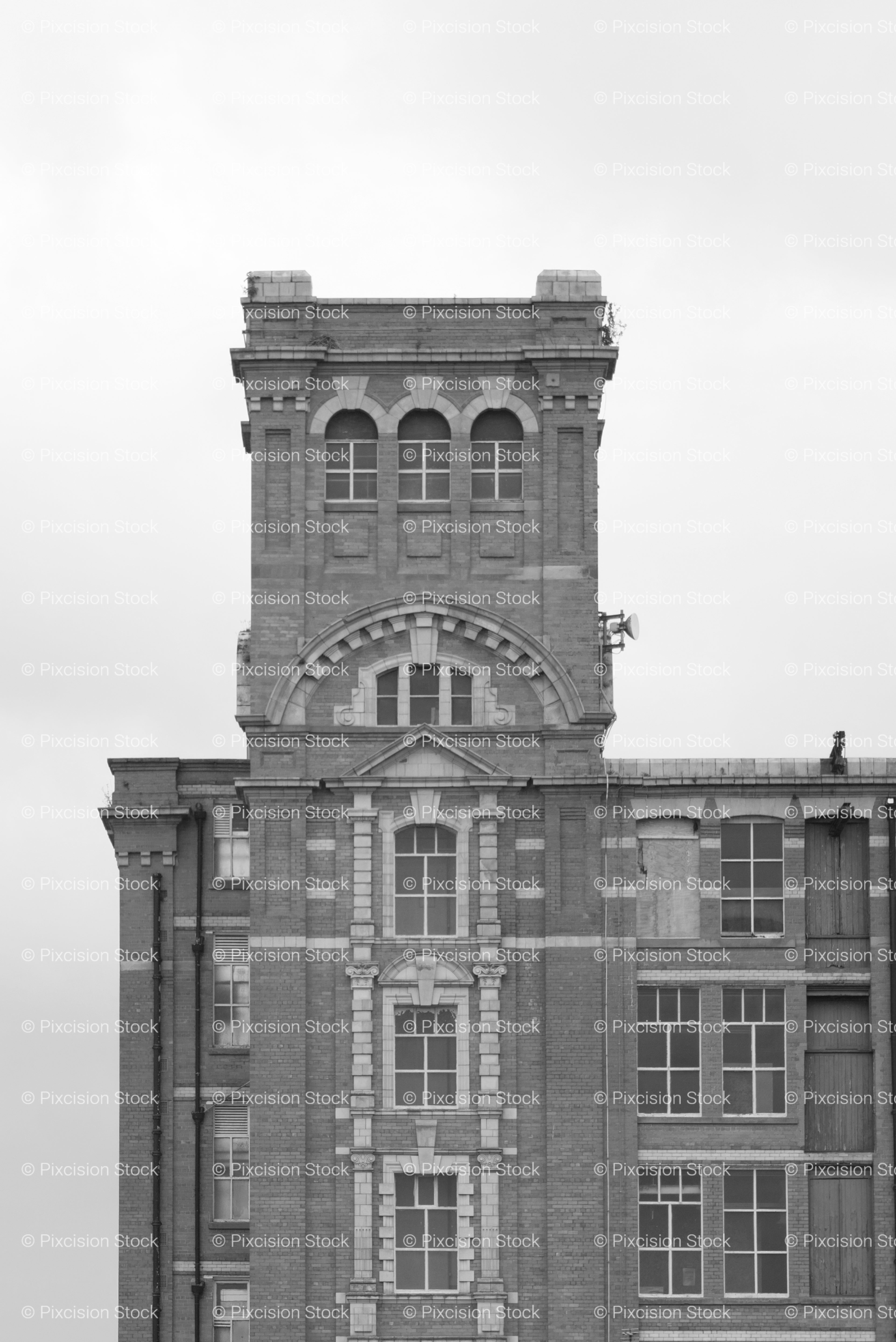 Ornate Brick Architecture of a Historic Mill Tower