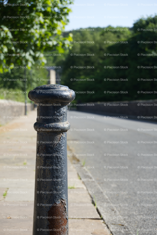 Vertical Shot of a Metal Bollard or Post 