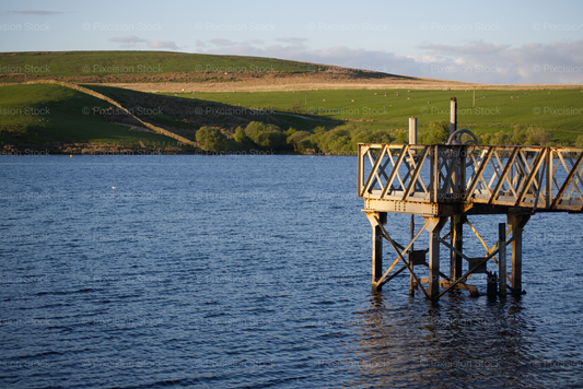 Elevated Footbridge Pier on the Edge of a Wide Lake