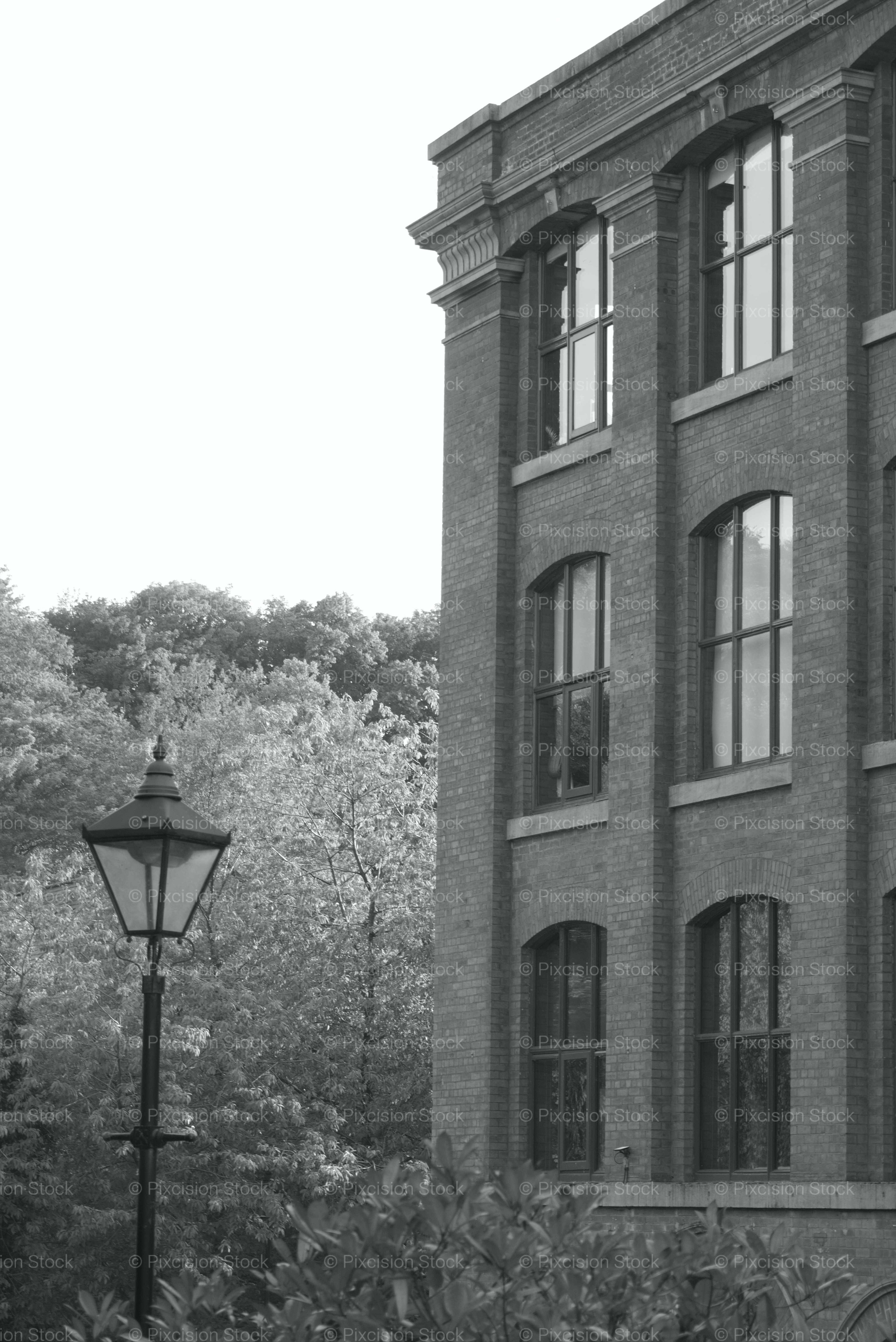Exterior View of a Multi-Story Brick Industrial Mill Building