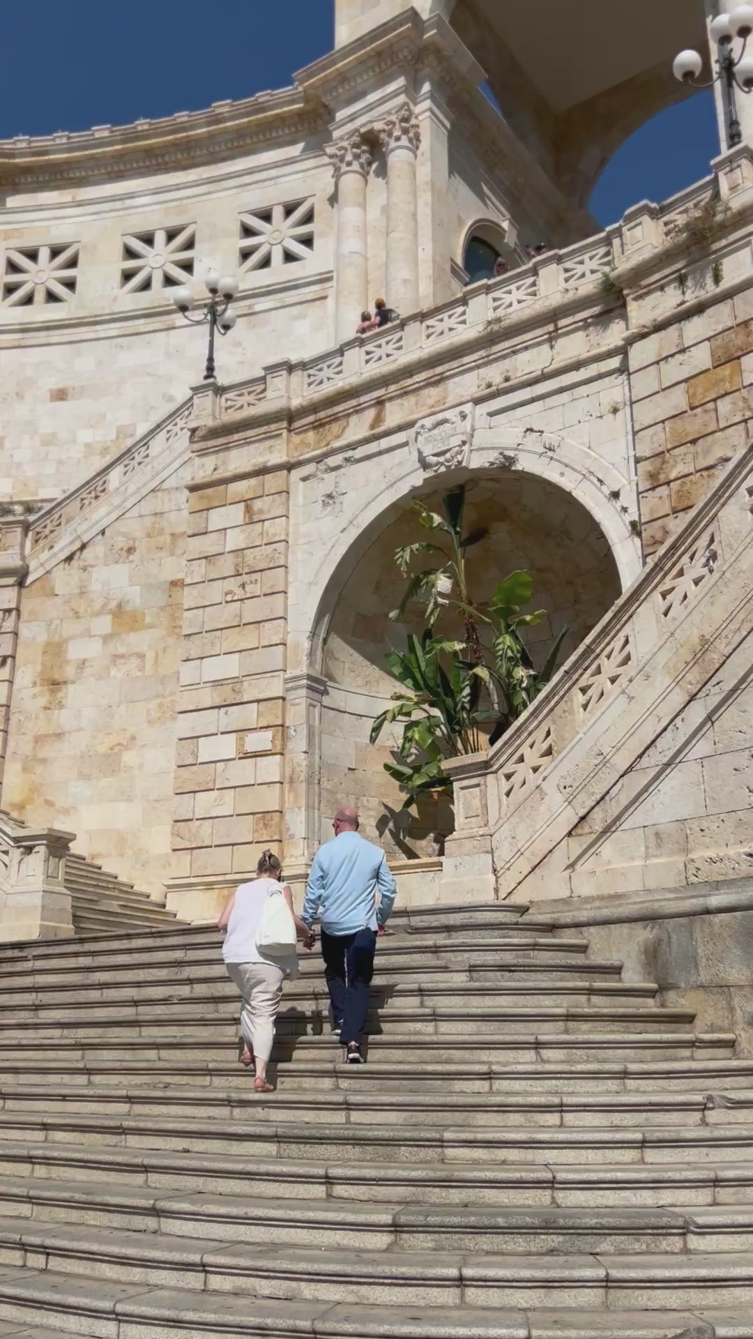 Couple Ascending Grand Staircase Bastione di Saint Remy Cagliari Sardinia Italy Cinematic Video