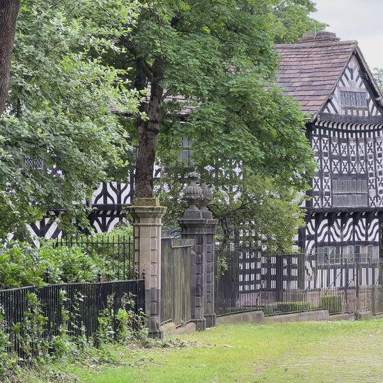 A video tour exploring the historic timber-framed architecture and grounds of Hall i' th' Wood Tudor manor house.